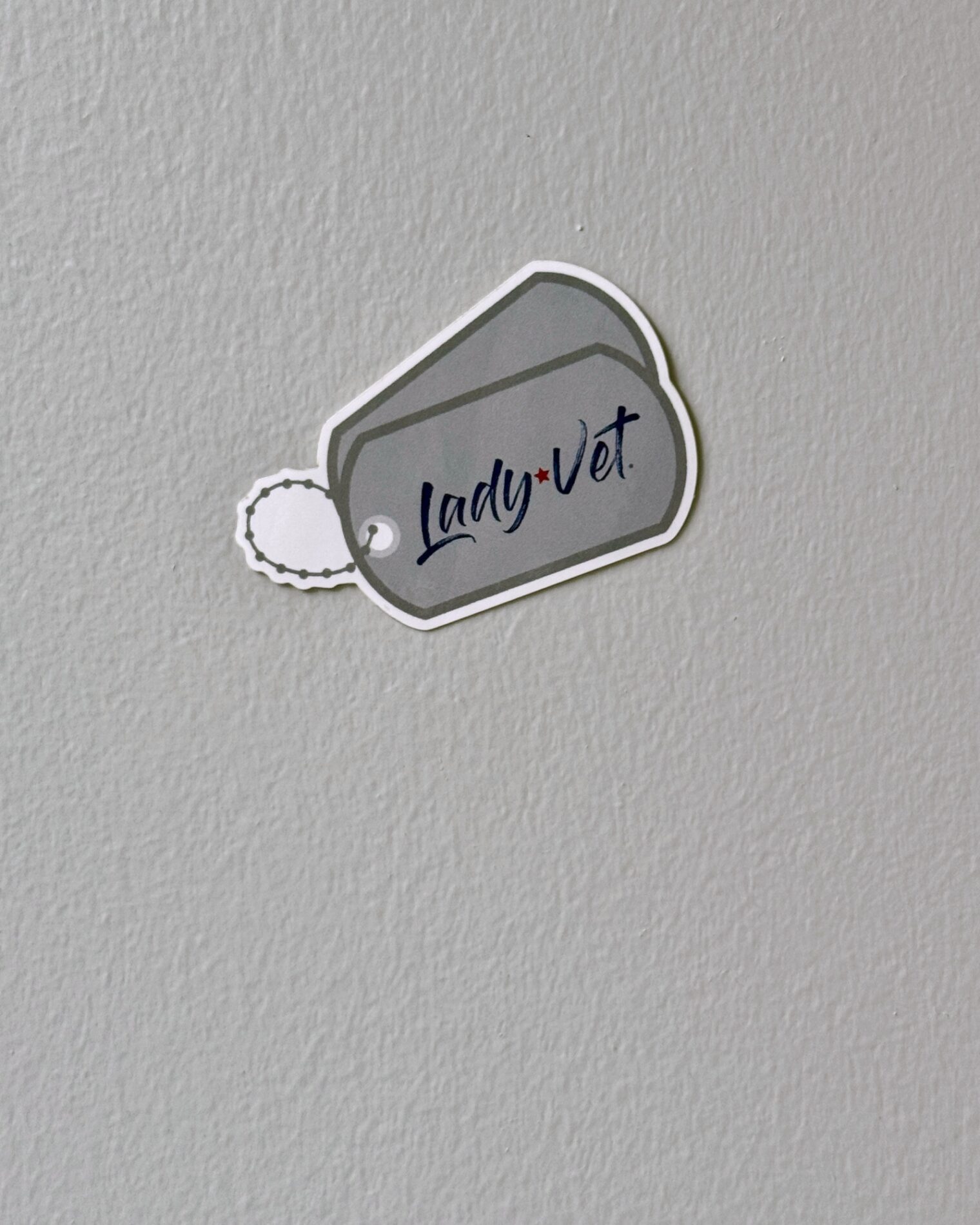Mini Dog Tag Sticker from Lady Vet